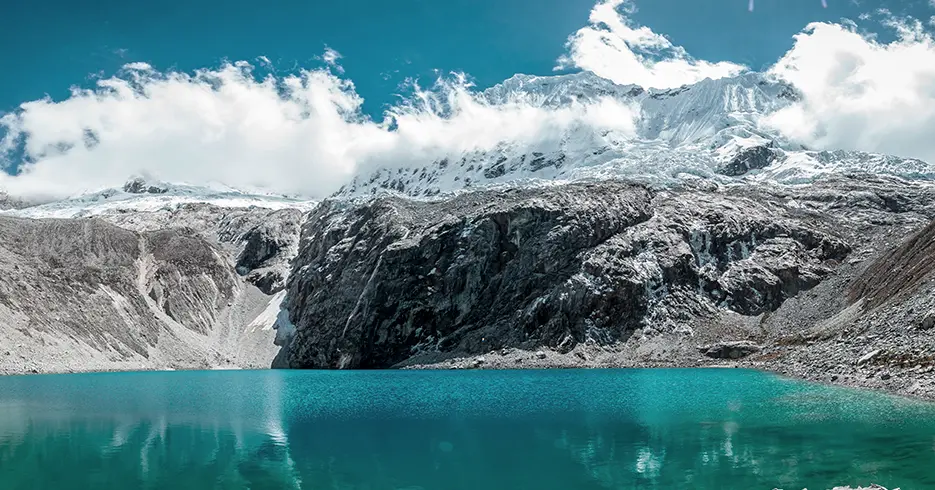 Huaraz Perú Tours para Todos los Gustos: Senderismo, Cultura y Paisajes de Ensueño 3 Laguna 69, la laguna más hermosa de todo Huaraz, una laguna turquesa y cristalina con montañas nevadas en la parte de arriba
